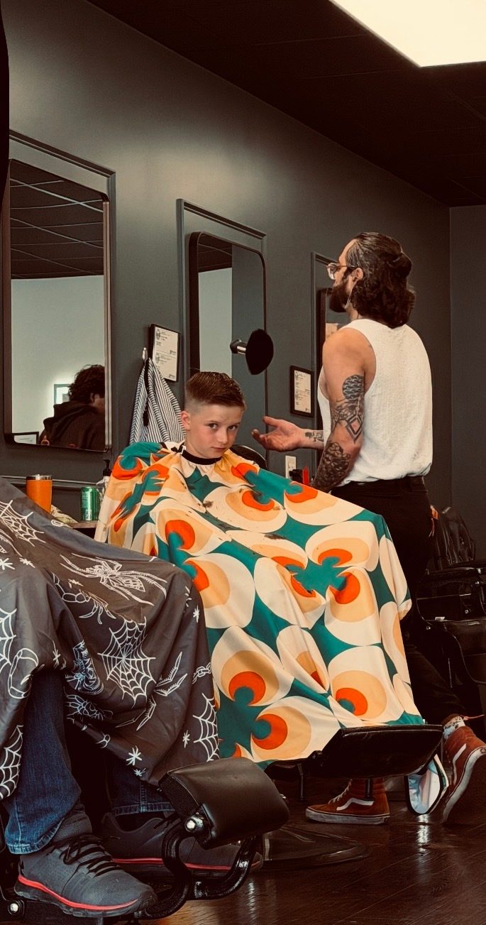 Kids haircut in progress at The Barber Studio, a kid friendly barber in Missoula