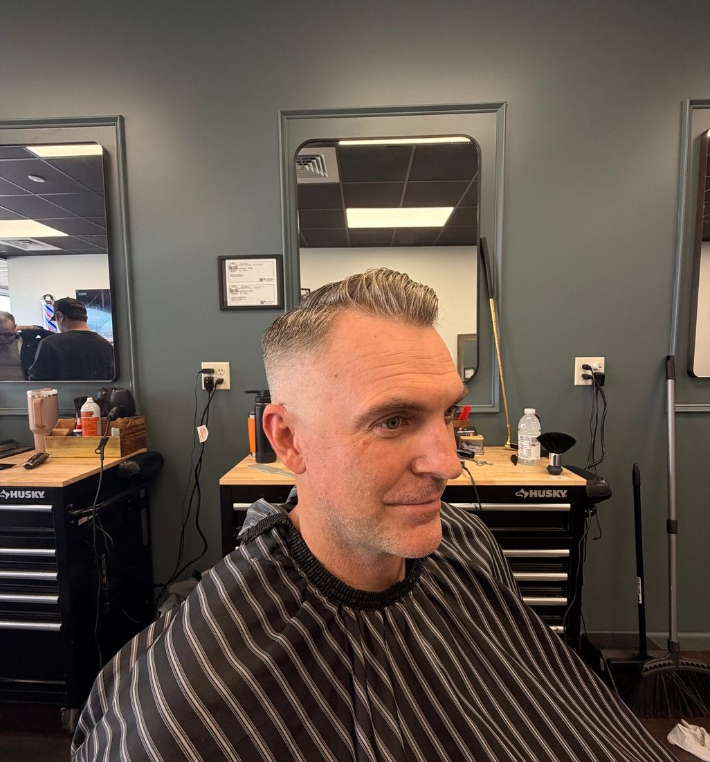 Textured quiff with a tapered fade, cut by Tony Santana at The Barber Studio in downtown Missoula