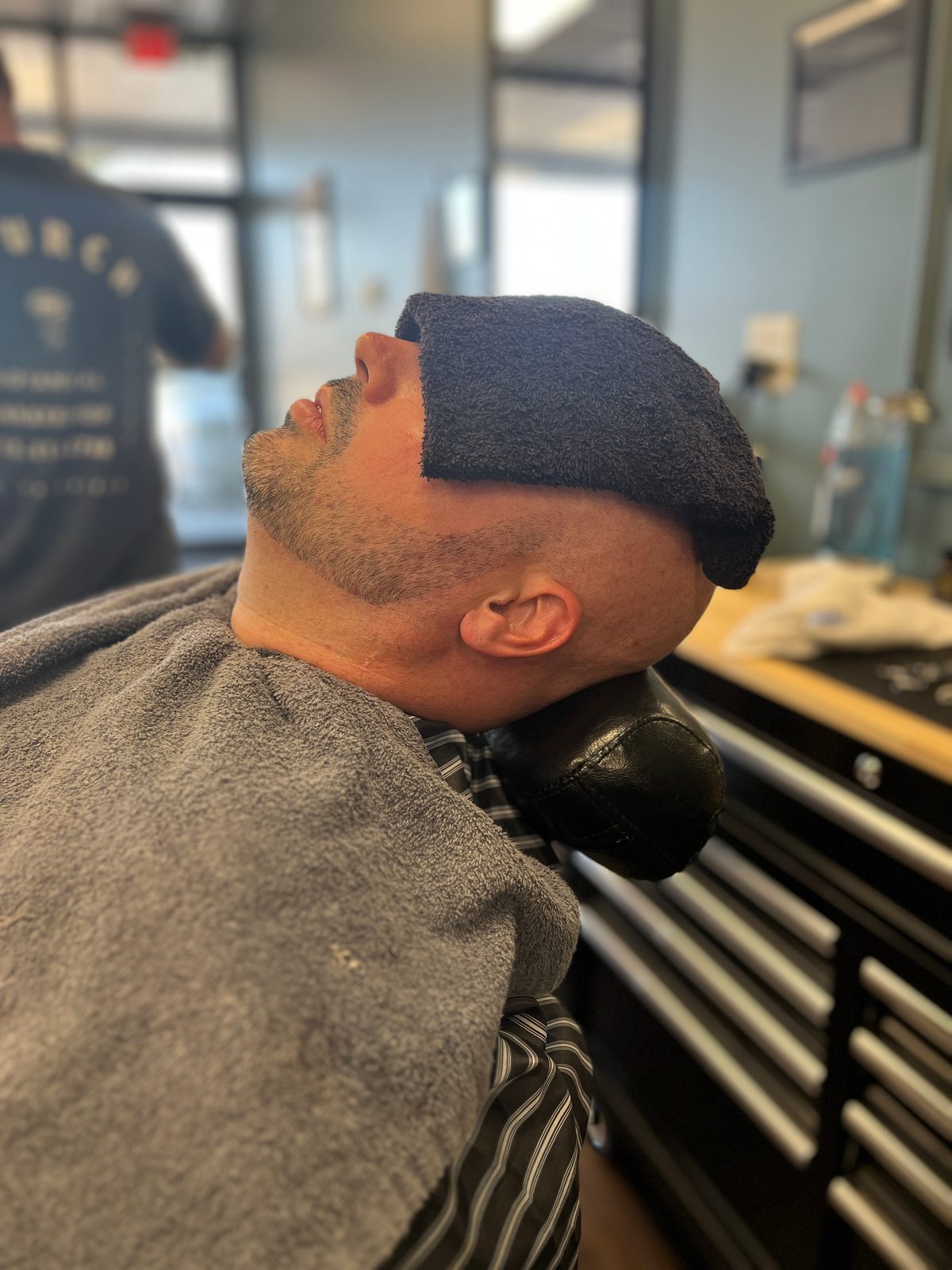 Hot towel laid before a straight razor shave at The Barber Studio in Missoula, Montana